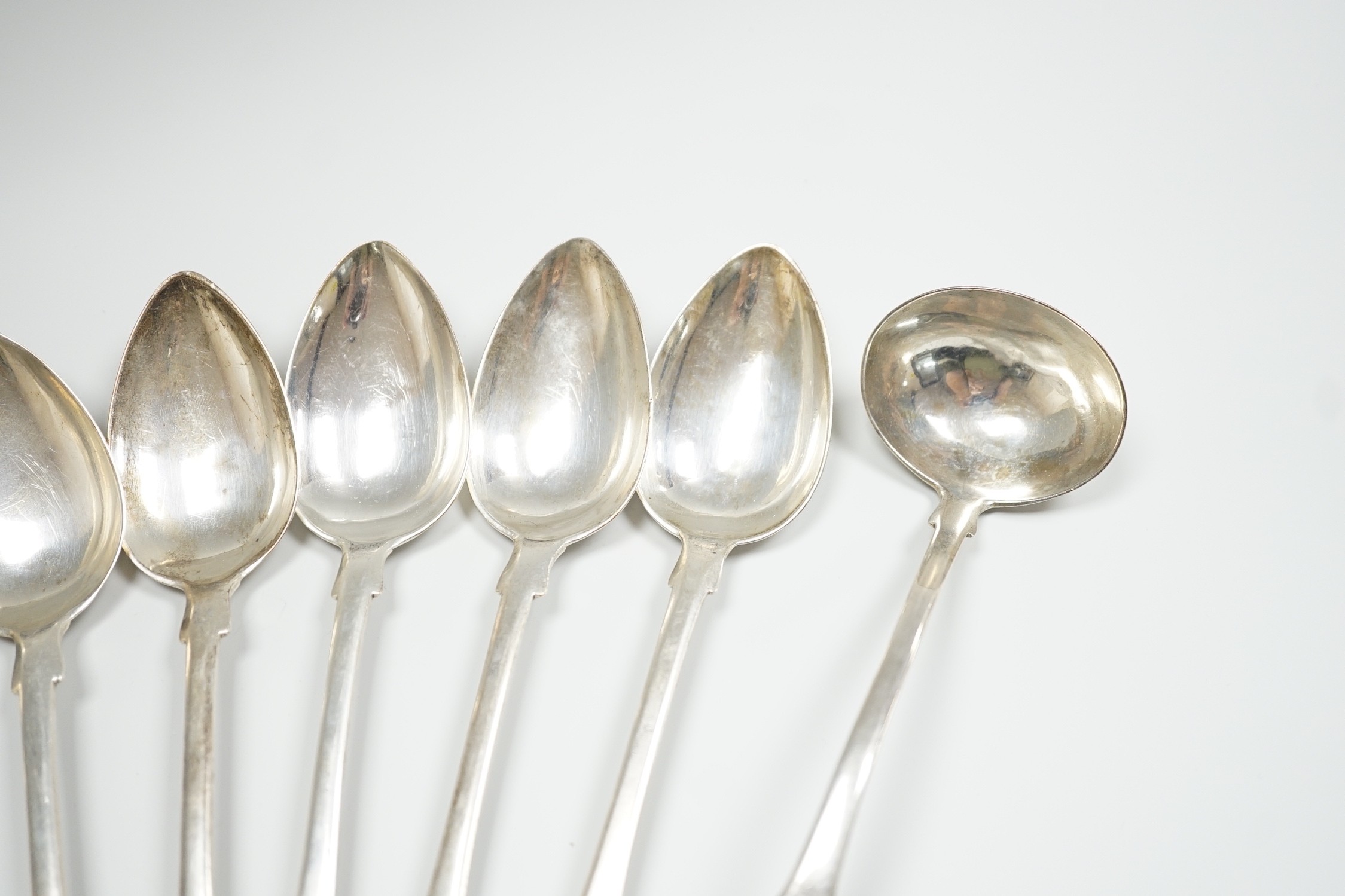 A set of nine early 19th century Scottish provincial silver fiddle pattern dessert spoons, 18.5cm and a pair of sauce ladles, by Alex MacLeod, Inverness, 11oz.
